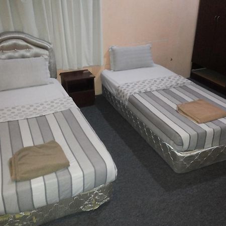 Green View Motel Kampong Sembulan Habitación foto