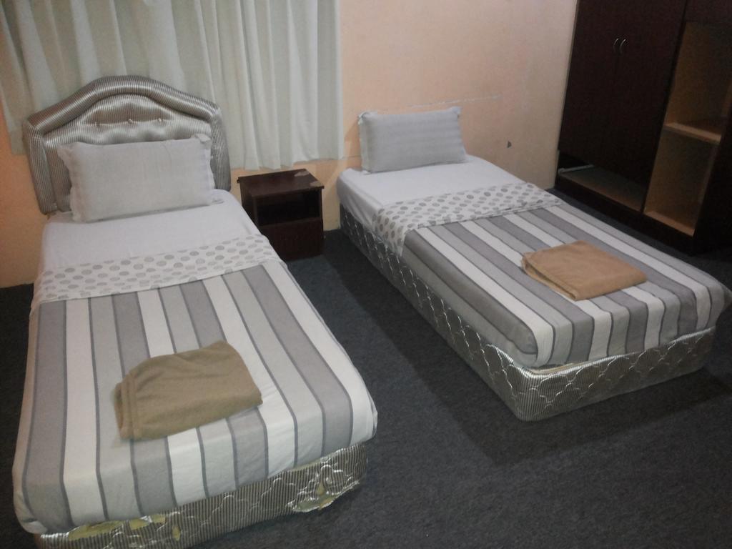 Green View Motel Kampong Sembulan Habitación foto